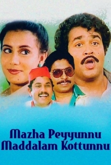 Película: Mazha Peyyunnu Maddalam Kottunnu
