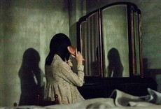 Escena de Retratos del Más Allá