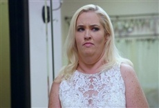 Escena de Mamá June: La transformación