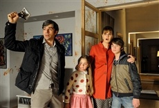 Escena de Un jefe en la sala de estar