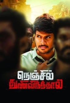 Nenjil Thunivirundhal on-line gratuito