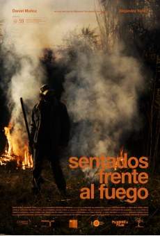 Sentados frente al fuego gratis